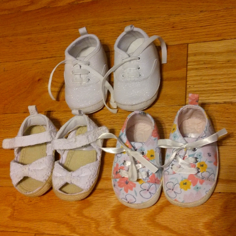 Three pairs of baby shoes